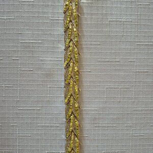 Gold-plated bracelet with pale green stones